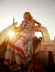 woman on truck sunset