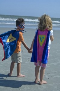 super heroes at the beach