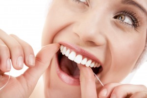 woman-flossing-close-up