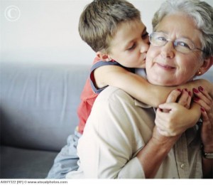 Loving Boy Kissing Grandmother